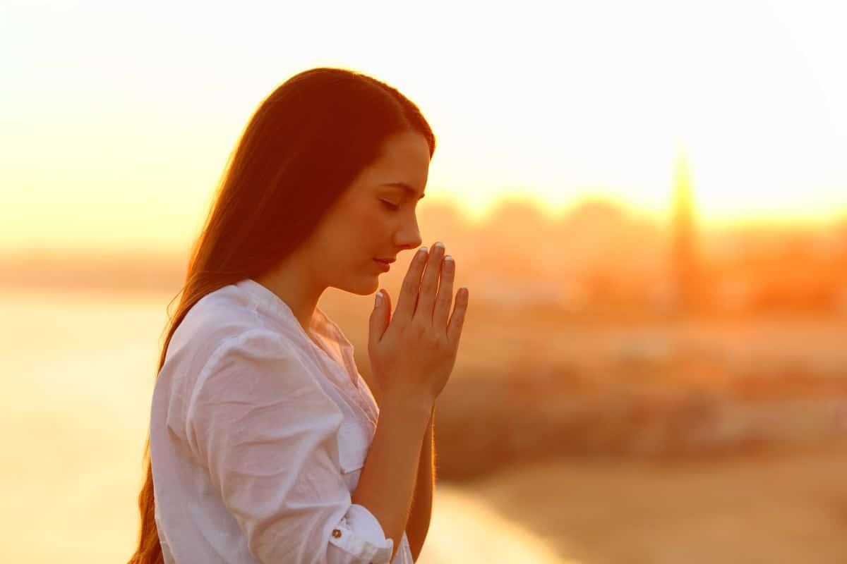 An ExMormon’s Thoughts on The Secret Lives of Mormon Wives Hulu TV Show 3 A woman praying.